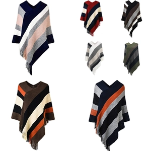 Detailed grid showing knitted ponchos with diagonal stripes and tassel fringe in diverse colors
