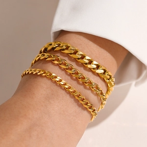 Three-piece gold plated stainless steel Cuban link bracelet set for women with polished finish