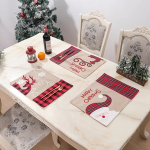 Linen Christmas placemat with reindeer, red plaid patchwork and festive holiday decor