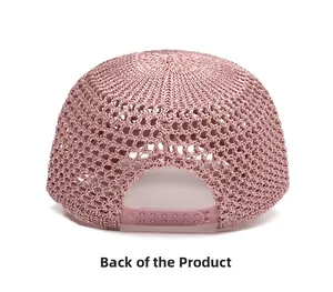 Detail view of the breathable hollow mesh weave and adjustable snapback on the pink baseball cap