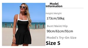 Detail view of black one-piece swimsuit with white trim and model sizing information
