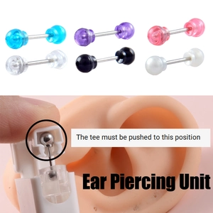 Disposable ear piercing gun set with six colorful crystal studs and positioning guide
