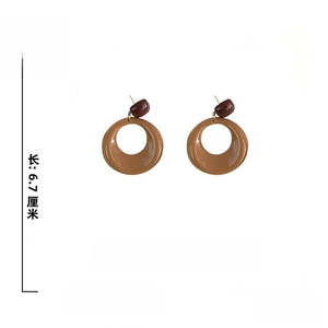 Detailed view of acrylic drop earrings showing 6.7cm length and 4.6cm width dimensions
