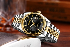 Detailed close-up of a two-tone quartz watch with diamond markers and date display
