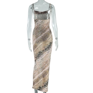 Detail of slim fit backless snake print midi dress with thin spaghetti straps