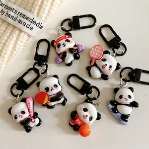 Set of 7 cute panda sports keychains in various poses like basketball and surfing