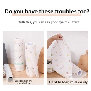 Detail of paper towel roll with strawberry and fruit prints for kitchen surfaces