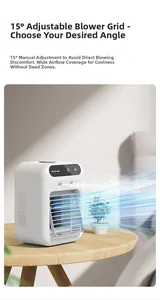 Mini white air cooler on wooden table showing adjustable 15-degree louvers and mist spray