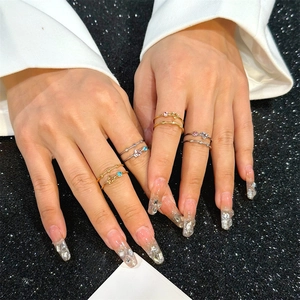 Minimalist stackable rings set with colorful gemstones and geometric charms for women