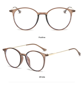 Front and 45-degree side views of round brown frames with sleek gold metal temples