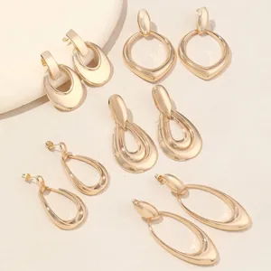 Luxury set of six gold irregular geometric stud earrings with a polished mirror finish