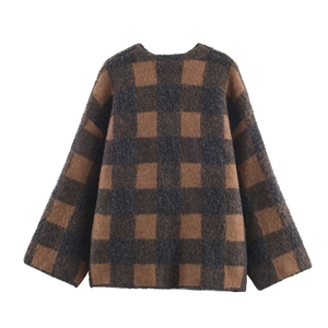 Brown and black oversized checkered knit sweater with a fuzzy vintage texture