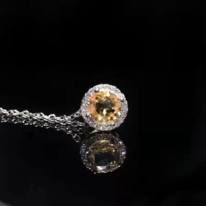 S925 sterling silver necklace with a round yellow citrine pendant and halo of zircons