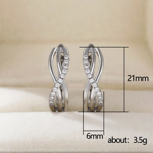 Silver infinity geometric hoop earrings with cubic zirconia in a velvet jewelry box