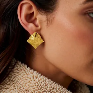 18k gold plated diamond-shaped mesh tassel earrings on a model showing modern vintage style