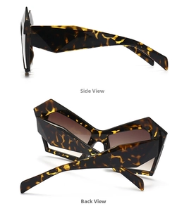 Detail view of tortoiseshell geometric sunglasses with faceted frame and gradient lenses