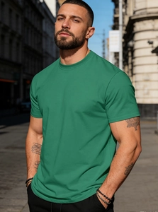 Close-up of dark green cotton T-shirt showing crew neck detail and soft fabric texture