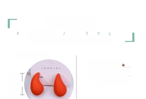 Detailed view of bright orange teardrop acrylic earrings with silver posts and R945 model tag