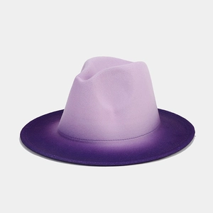 Detailed close-up of a gradient purple wool felt fedora with a wide brim and ombre finish