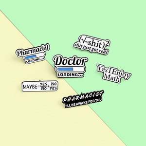 Close-up of six enamel pins featuring pharmacist and doctor themes on yellow background
