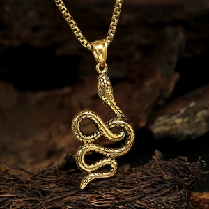 Creative gold cobra pendant necklace with snake infinity symbol on rustic wood