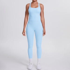 Light blue yoga set featuring a racerback sports tank top and high-waisted side pocket leggings
