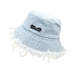 Light blue denim bucket hat with stylish fringe brim and woven label for sun protection