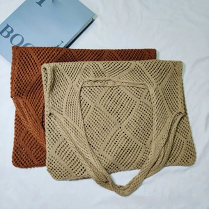 Flat lay of hollow knit tote bags in brown and beige with stylish diamond crochet pattern