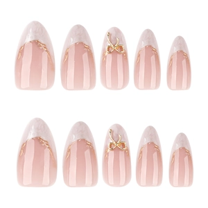 Short almond press-on nails with white French tips and gold butterfly accent