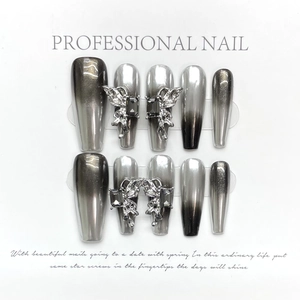 Silver-black gradient butterfly press-on nails with 3D metal charms and cat-eye finish