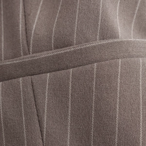 Close-up of brown striped woven fabric texture showing fine vertical white pinstripes