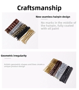 Detail of assorted metal bobby pins in gold, silver, bronze and black finishes