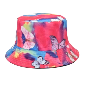Close-up of vibrant tie-dye bucket hat with detailed colorful butterfly print patterns