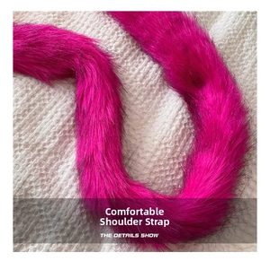 Detail of soft rose pink faux fur shoulder strap with dense plush texture and shine