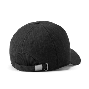 Detail of adjustable metal buckle and strap on back of black winter cotton baseball cap