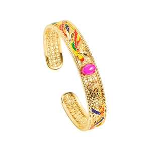 Bracciale dragone e fenice in oro antico con smalto colorato e incastonato con rubino prezioso