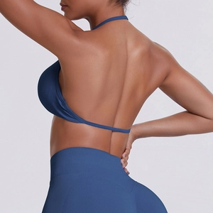 Detail view of steel blue seamless backless halter yoga bra and high waist leggings set