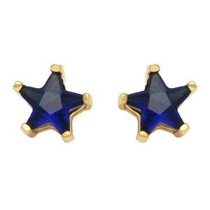 Close-up of royal blue star-shaped zircon earrings with gold claw settings in detail