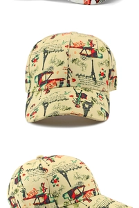 Detalle de gorra de béisbol vintage con estampado de la Torre Eiffel y collage floral