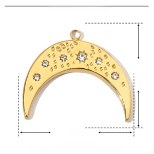 Macro view of a gold crescent moon pendant with rhinestones and detailed dimensions