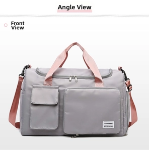 Front view of large gray waterproof fitness bag with pink straps and multi-pocket design