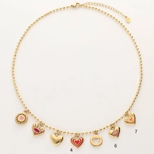Golden bead chain necklace featuring seven assorted colorful candy-style heart pendants