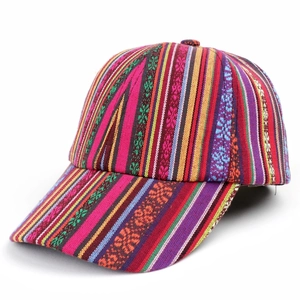 Detail view of ethnic style baseball cap featuring multi-color woven geometric patterns