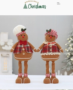 Detail of Christmas gingerbread plush dolls with waffle texture and festive red plaid vests
