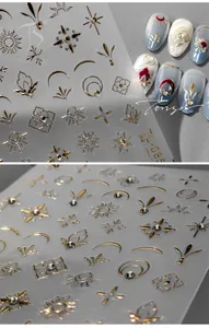 Détail macro des stickers ongles 5D TL-085 avec soleil lune étoiles dorés et strass