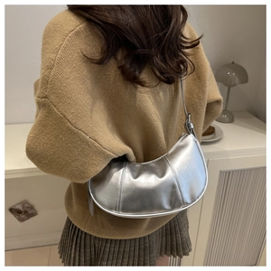 Silver crescent hobo bag for women with minimalist metallic finish and shoulder strap