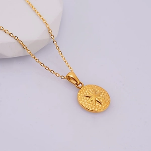 18K gold plated stainless steel necklace with textured starburst round coin pendant