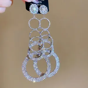 Sparkling tiered round tassel drop earrings with crystal pavé and silver finish