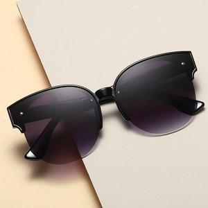 Retro round cat-eye sunglasses with purple gradient lenses and gold rivet accents