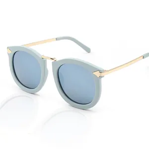Retro cat-eye sunglasses with blue frame, mirrored lenses and gold metal temples